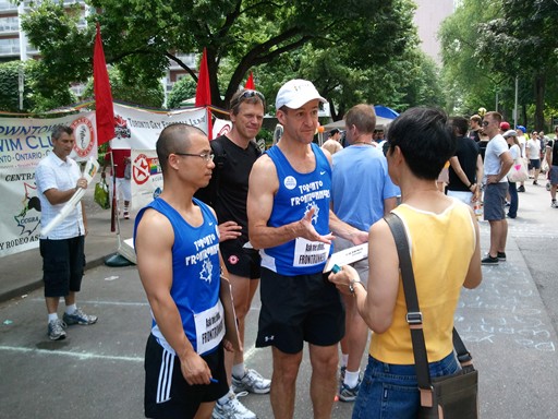 Frontrunners Toronto volunteers talking to passers-by about getting involved at the 2011 SportZone